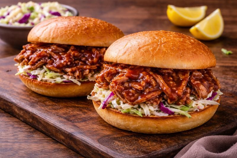 pulled pork bbq sandwiches with cabbage on toasted buns