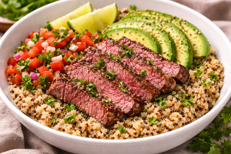 steak quinoa grain bowl with avocado cilantro and lime